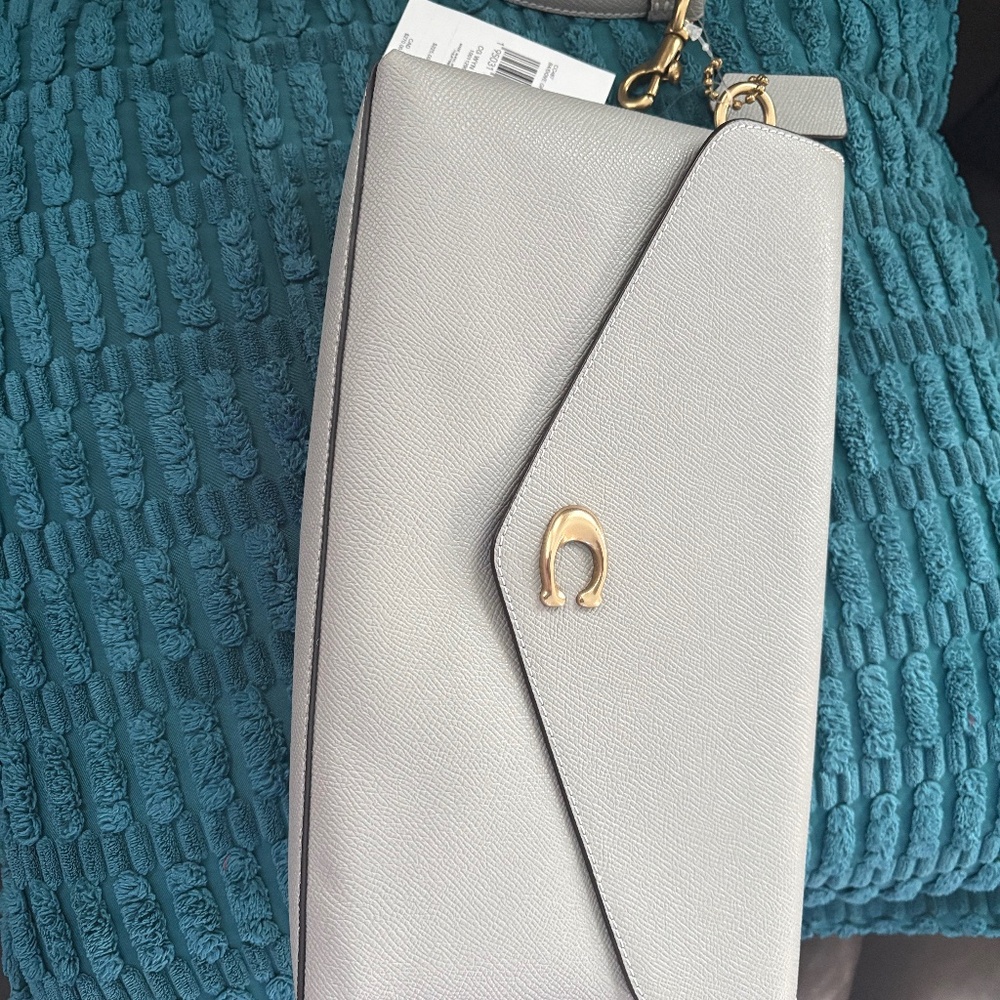Coach clutch/wristlet